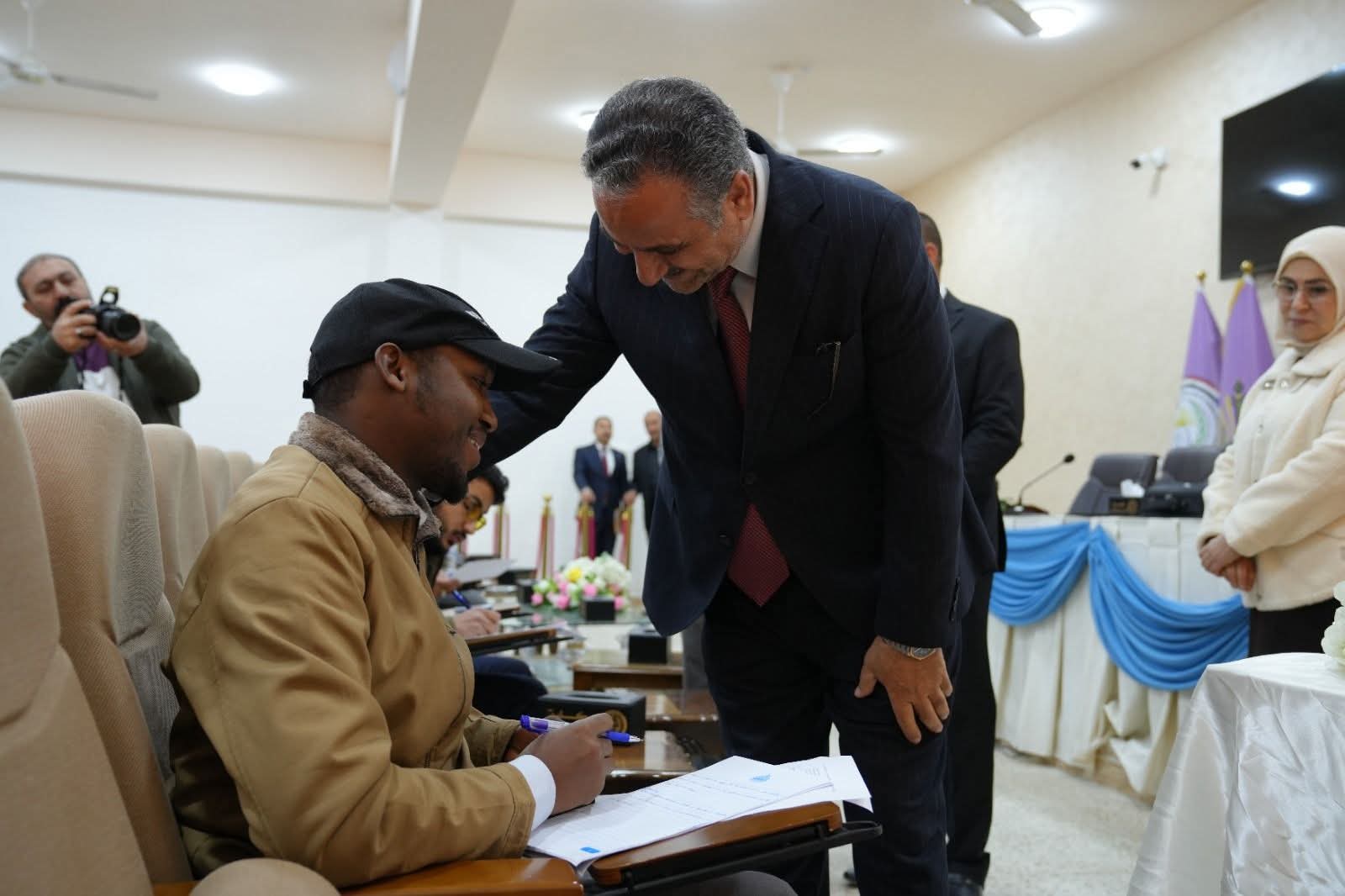 The university president is monitoring the examination process in the colleges.